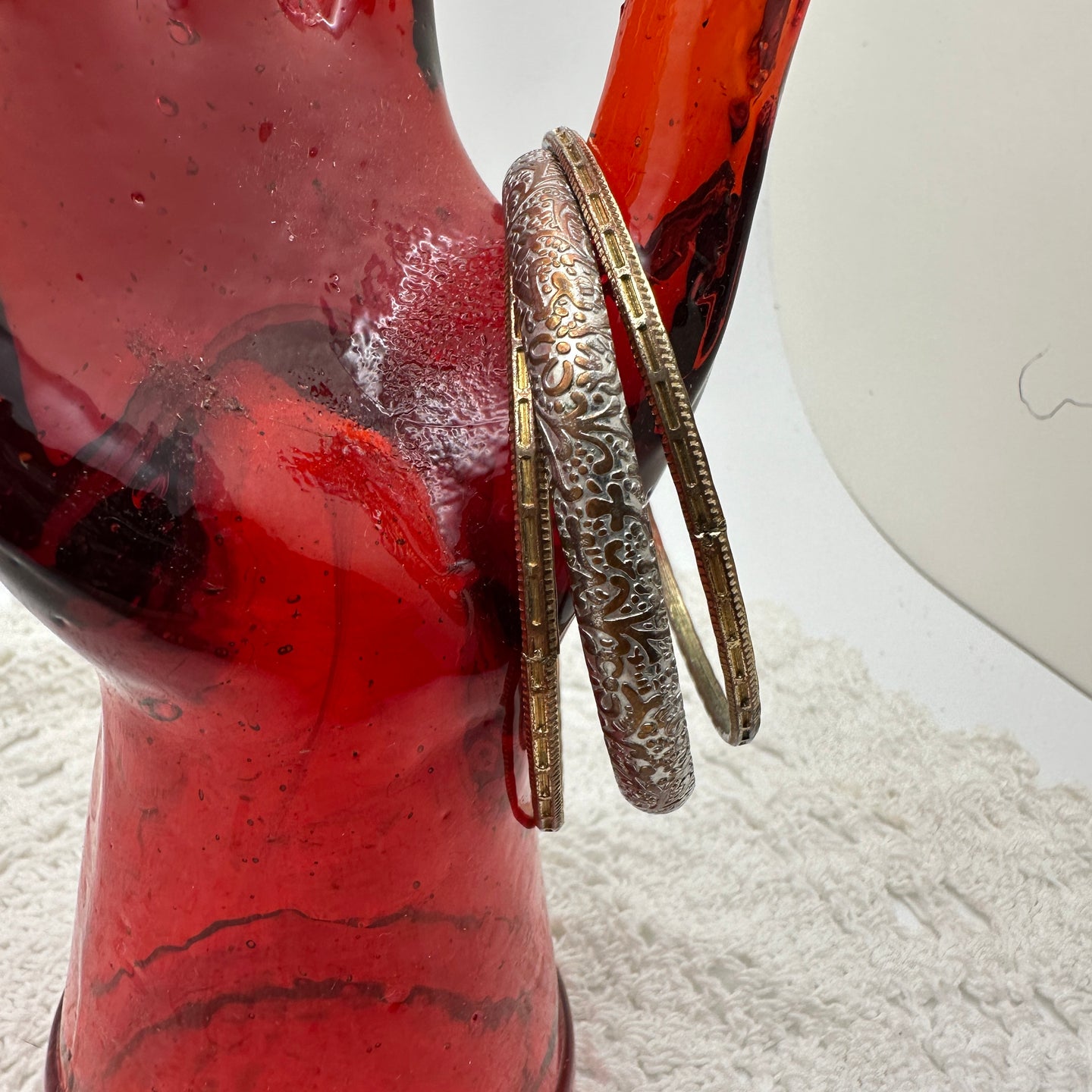 Three Gold Bangle Bracelets